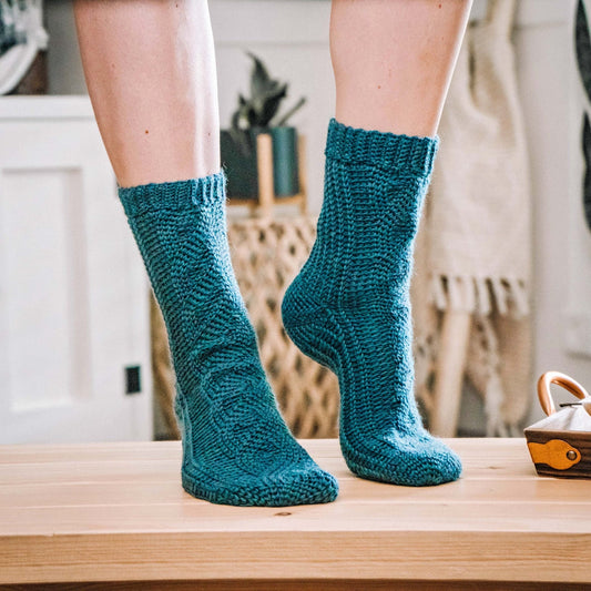 All Cabled Up In Sunshine Crochet Socks Pattern